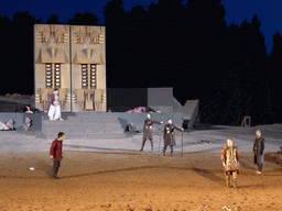 Aegisthus and his soldiers, herald, chorus, Clytemnestra and the corpses of Agamemnon and Cassandra at the gates of Argos at the stage of the Greek Theatre at the Parco Archeologico della Neapolis park, during the play `Agamemnon` by Aeschylus