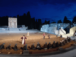 Clytemnestra, Aegisthus, herald and chorus at the stage of the Greek Theatre at the Parco Archeologico della Neapolis park, during the play `Agamemnon` by Aeschylus