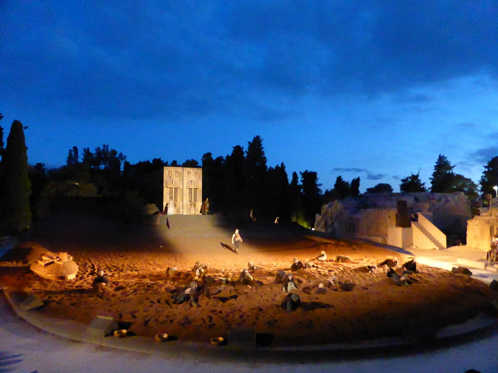 Chorus, herald, Clytemnestra and Aegisthus at the gates of Argos at the stage of the Greek Theatre at the Parco Archeologico della Neapolis park, during the play `Agamemnon` by Aeschylus