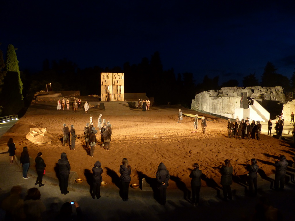Actors receiving applause at the stage of the Greek Theatre at the Parco Archeologico della Neapolis park, at the end of the play `Agamemnon` by Aeschylus