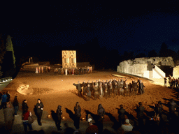 Actors receiving applause at the stage of the Greek Theatre at the Parco Archeologico della Neapolis park, at the end of the play `Agamemnon` by Aeschylus