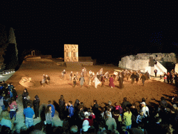 Actors receiving applause at the stage of the Greek Theatre at the Parco Archeologico della Neapolis park, at the end of the play `Agamemnon` by Aeschylus