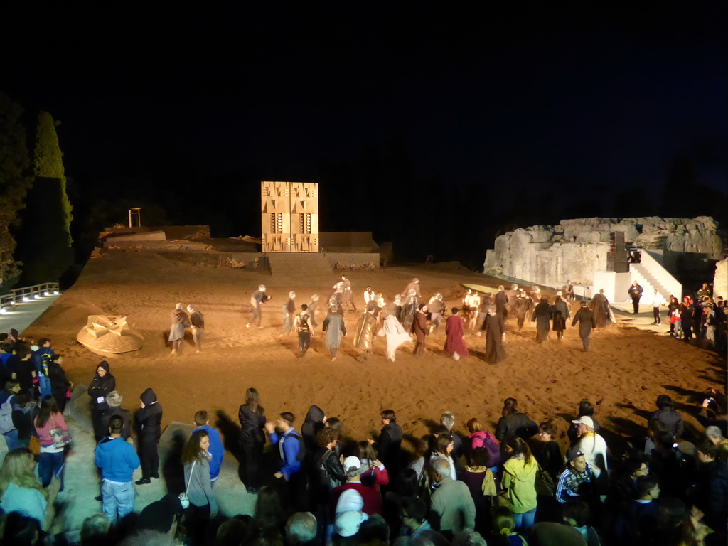 Actors receiving applause at the stage of the Greek Theatre at the Parco Archeologico della Neapolis park, at the end of the play `Agamemnon` by Aeschylus