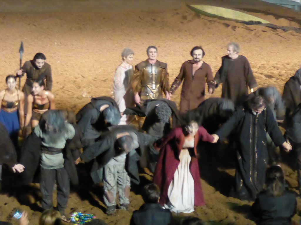 Actors receiving applause at the stage of the Greek Theatre at the Parco Archeologico della Neapolis park, at the end of the play `Agamemnon` by Aeschylus