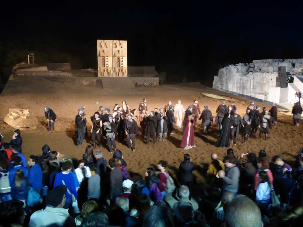 Actors receiving applause at the stage of the Greek Theatre at the Parco Archeologico della Neapolis park, at the end of the play `Agamemnon` by Aeschylus