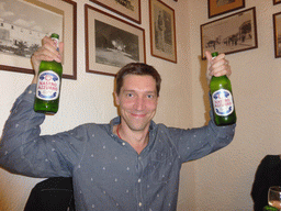 Tim with two Nostro Azzurro beers at the Trattoria Archimede restaurant at the Via Mario Gemmellaro street