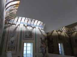 Walls, ceiling and mirror in one of the halls of the Palazzo Borgia del Casale palace