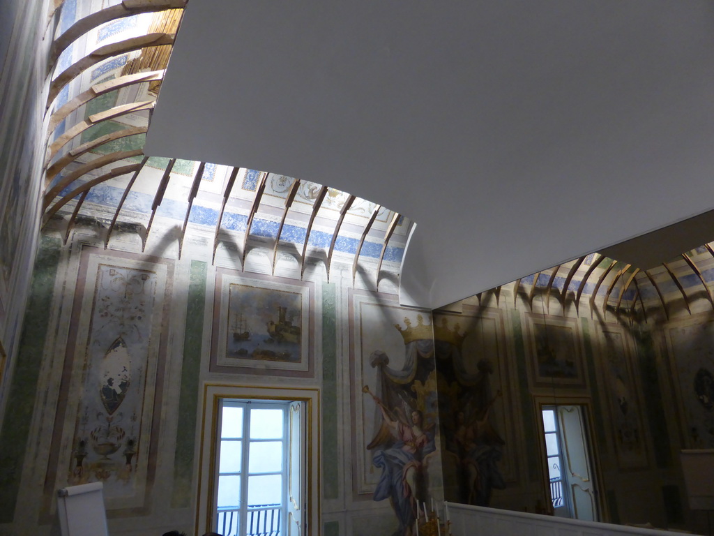 Walls, ceiling and mirror in one of the halls of the Palazzo Borgia del Casale palace