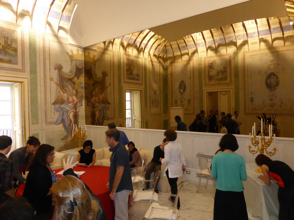 Coursr participants in one of the halls of the Palazzo Borgia del Casale palace