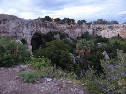 The Latomia del Paradiso quarry at the Parco Archeologico della Neapolis park, viewed from the back side of the Greek Theatre, at sunset