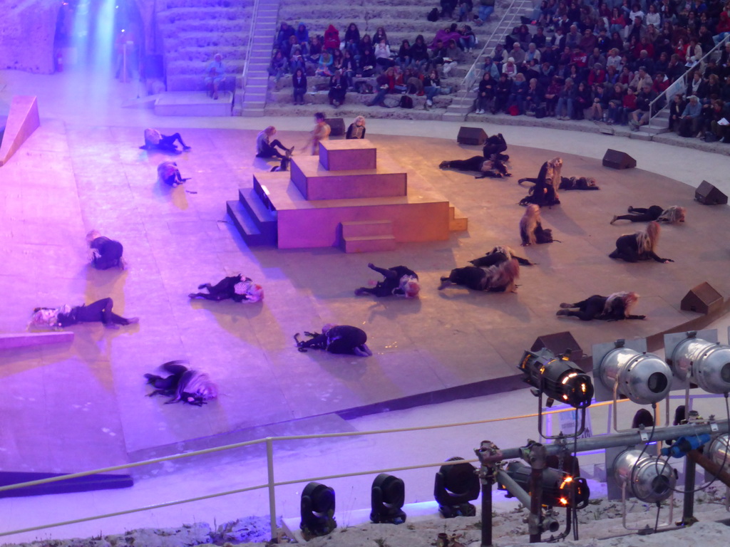 Actors at the stage of the Greek Theatre at the Parco Archeologico della Neapolis park, during the plays `Choephori` and `Eumenides` by Aeschylus, at sunset