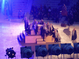 Actors at the stage of the Greek Theatre at the Parco Archeologico della Neapolis park, during the plays `Choephori` and `Eumenides` by Aeschylus, at sunset