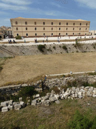 Building of the Architecture Faculty of the University of Catania and the square in front of the Castello Maniace castle, viewed from the outer wall of the Castello Maniace castle