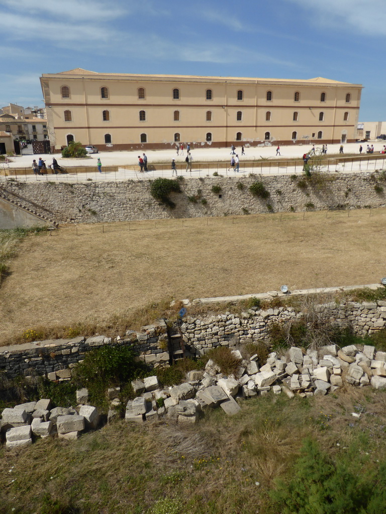 Building of the Architecture Faculty of the University of Catania and the square in front of the Castello Maniace castle, viewed from the outer wall of the Castello Maniace castle