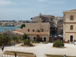 The square in front of the Castello Maniace castle and the Via Castello Maniace street, viewed from the outer wall of the Castello Maniace castle