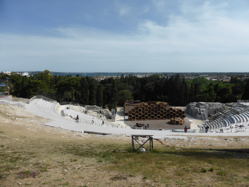 The Greek Theatre at the Parco Archeologico della Neapolis park and the Porte Grande harbour, viewed from the Nymphaeum