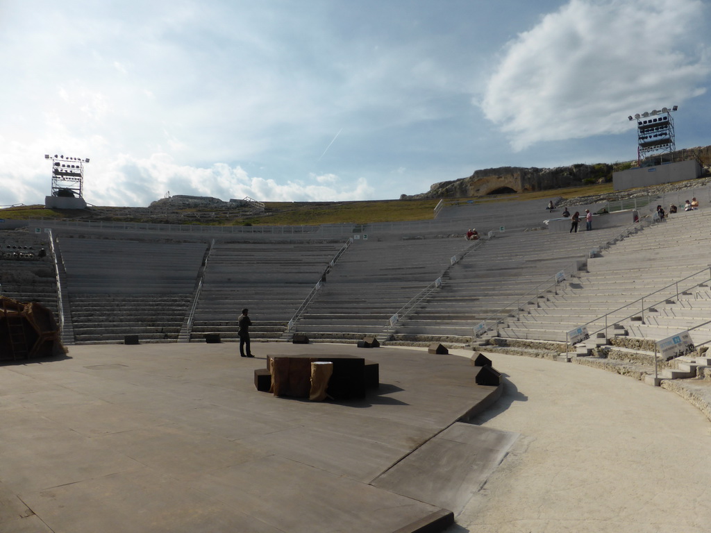 Actor at the stage at the Greek Theatre at the Parco Archeologico della Neapolis park, practicing for the play `The Wasps` by Aristophanes