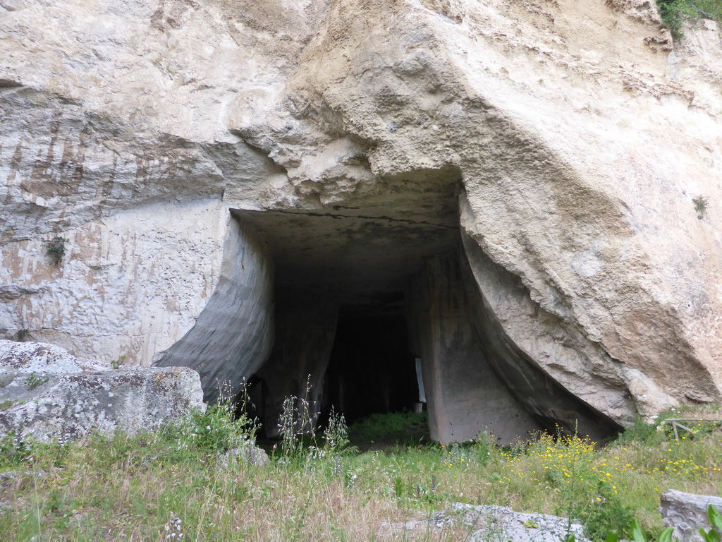 The entrance to the Grotta dei Cordari cave at the Latomia del Paradiso quarry at the Parco Archeologico della Neapolis park