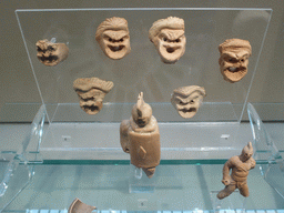 Masks and statuettes at the upper floor of the Paolo Orsi Archaeological Museum