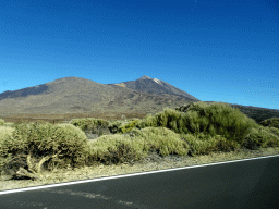 The Pico Vieje peak and Mount Teide, viewed from the rental car on the TF-21 road on the southwest side of the Teide National Park