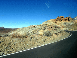 The TF-21 road and rocks on the south side of the Teide National Park, viewed from the rental car
