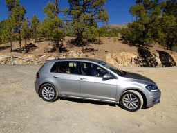 Miaomiao and Max in our rental car at a parking place along the TF-21 road on the southwest side of the Teide National Park