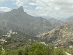 The Roque Bentayga rock and the north side of the town, viewed from the tour bus on the GC-60 road