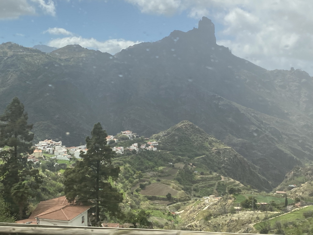 The Roque Bentayga rock and the north side of the town, viewed from the tour bus on the GC-60 road