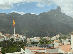 The Roque Bentayga rock and the town center, viewed from the tour bus on the GC-60 road