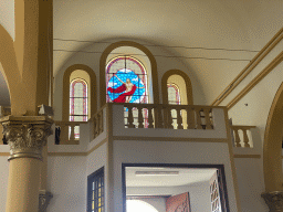 Stained glass windows above the main door of the Parroquia de Nuestra Señora del Socorro church