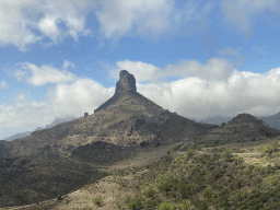 The Roque Nublo rock, viewed from the tour bus on the GC-60 road