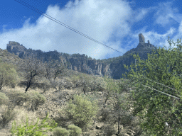 The Roque Nublo rock, viewed from the tour bus on the GC-60 road