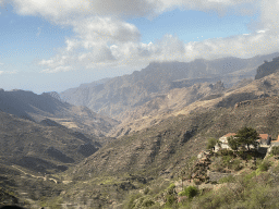 Mountains anr the Casa Rural Isla de Cuba hotel at the town of Timagada, viewed from the tour bus on the GC-60 road