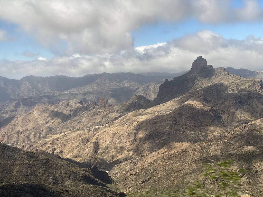 The Roque Nublo rock, viewed from the tour bus on the GC-60 road