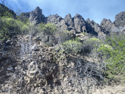 Rocks next to the GC-60 road on the south side of town, viewed from the tour bus