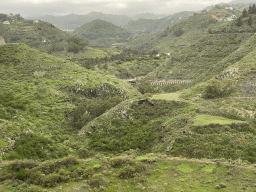 Dam at the Barranco del Zapatero river, viewed from the tour bus on the GC-21 road near the town of San José del Álamo