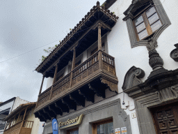 Wooden balcony of a house at the Calle Real de la Plaza street