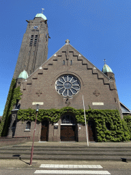 West side and tower of the Sint-Willibrorduskerk church, viewed from the Hoolstraat street