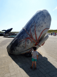 Max with a statue of a Sperm Whale with Giant Squid at the Ecomare seal sanctuary at De Koog