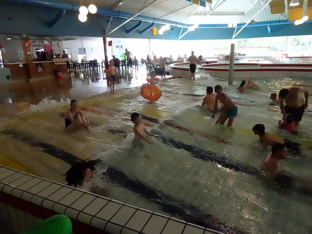 Max during a wave at Swimming Paradise Calluna at the Roompot Vakanties Kustpark Texel at De Koog