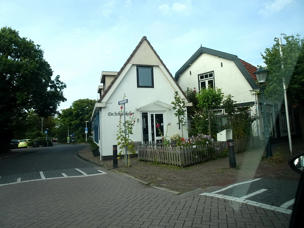 Houses at the Vogelenzang street at Den Burg, viewed from the car