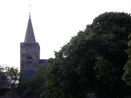 Tower of the Burghtkerk church at Den Burg, viewed from the Groeneplaats square, at sunset