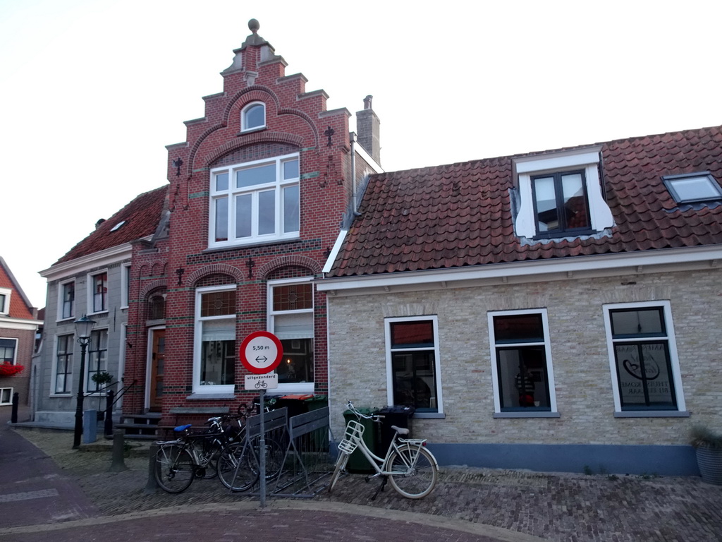 Front of houses at the Zwaanstraat street at Den Burg, at sunset