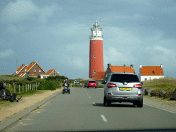 The Vuurtorenweg road and the southeast side of the Lighthouse Texel at De Cocksdorp, viewed from the car