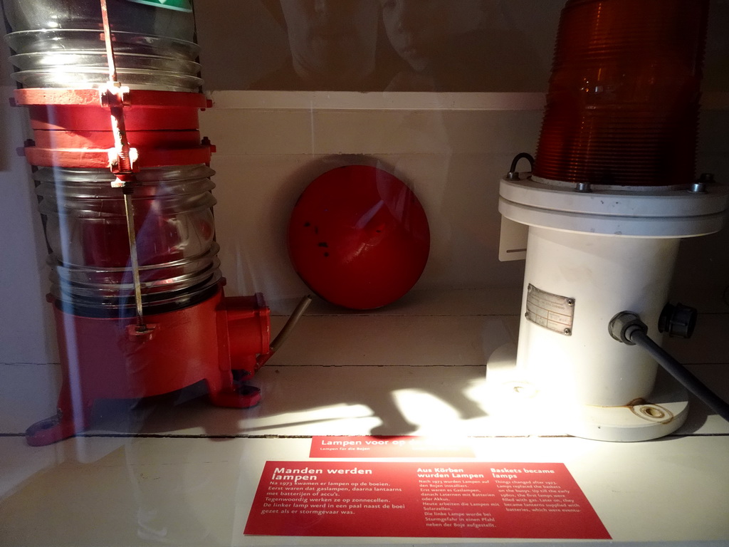 Buoy lamps at the third floor of the Lighthouse Texel at De Cocksdorp, with explanation