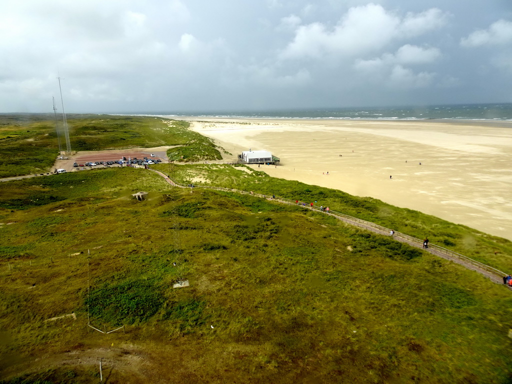 The beach, dunes and the parking lot of the Lighthouse Texel at De Cocksdorp, viewed from the fourth floor