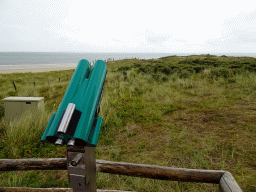 Binoculars at the dunes at the northeast side of the Lighthouse Texel at De Cocksdorp