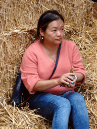 Miaomiao with a chick at the Texel Sheep Farm at Den Burg