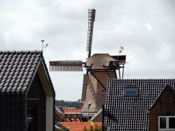 The Traanroeier windmill at Oudeschild, viewed from the dike at the Bolwerk street