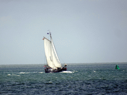 Boat in the Wadden Sea, viewed from the dike at the Bolwerk street at Oudeschild